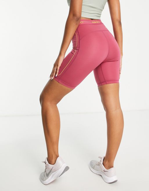 Nike Pro Training Seasonal high rise booty shorts in pink and orange