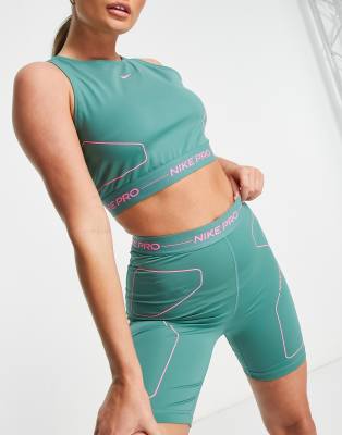 Nike Pro Training Seasonal tank in green and pink