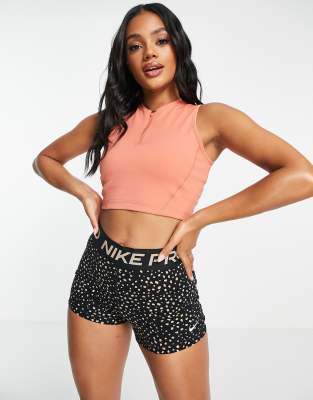 Nike Pro Training seasonal zip front crop top in pink - ASOS Price Checker