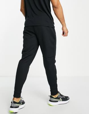 nike training therma track pants