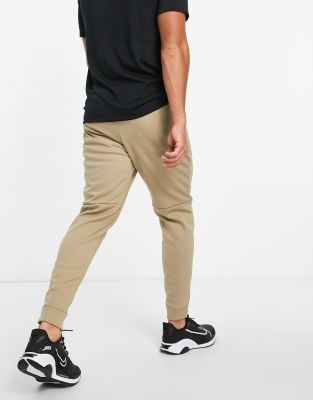 nike training therma track pants