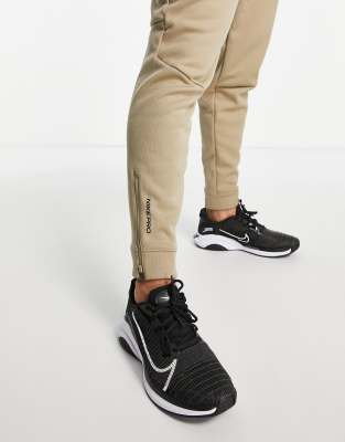 nike training therma track pants