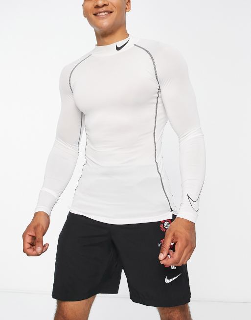 Nike Pro Training tight long sleeve mock tight top in white | ASOS