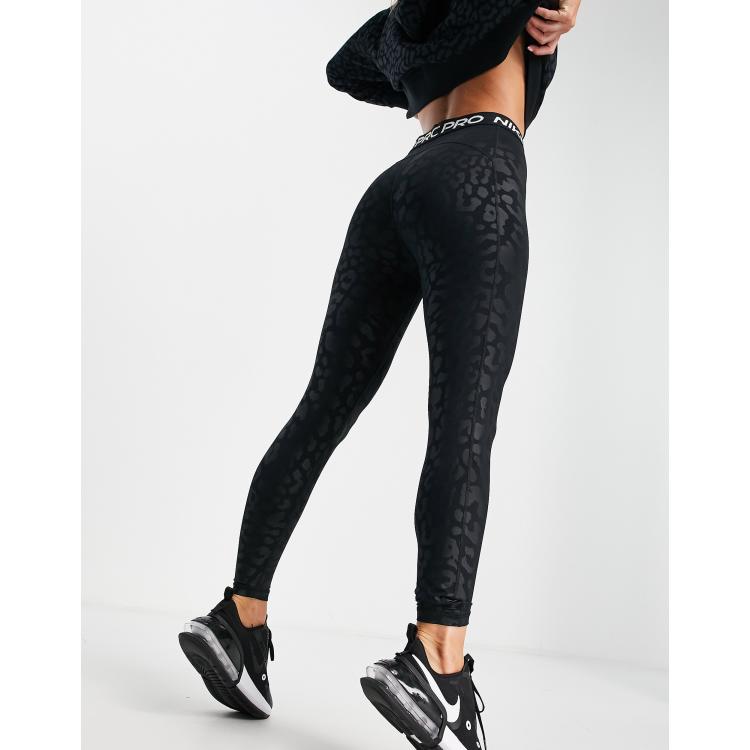 Nike Pro Training tonal leopard print leggings in black, ASOS