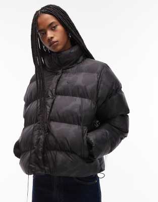 Nike - Pufferjacke mit Leopardenmuster-Schwarz