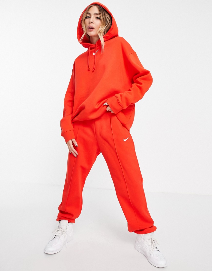 Nike pull over fleece hoodie in chile red
