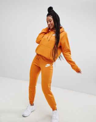 nike rally burnt orange pullover logo hoodie