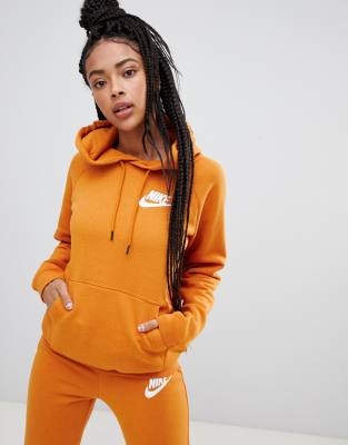 nike rally burnt orange pullover logo hoodie