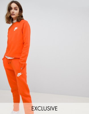 survetement nike femme orange