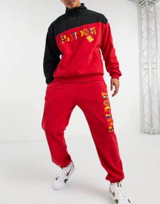 Nike Re-Issue JDI sweatpants in red | ASOS