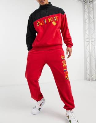 Nike Re-Issue JDI sweatpants in red | ASOS