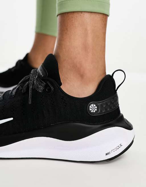 Nike React Infinity Run Flyknit 4 sneakers in black & white | ASOS