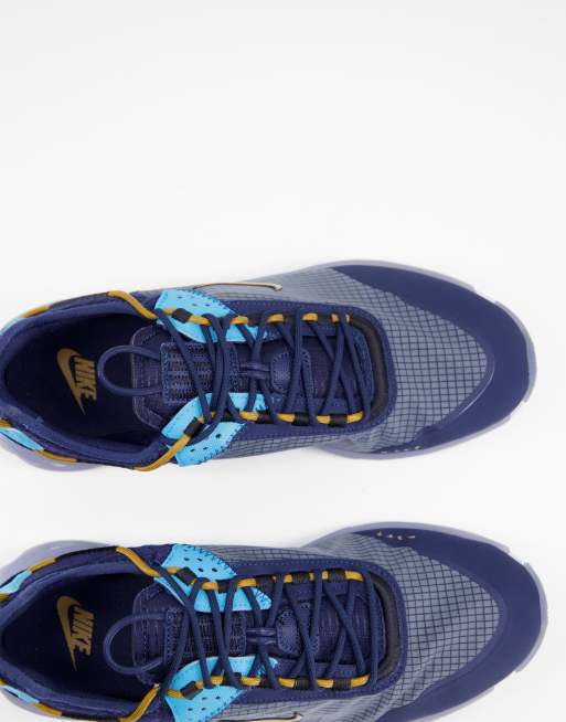 Nike React Live trainers in blue and yellow, 2 of 4