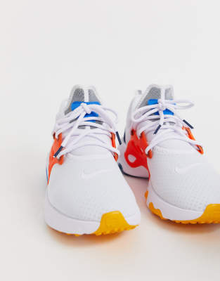 orange and white nike presto