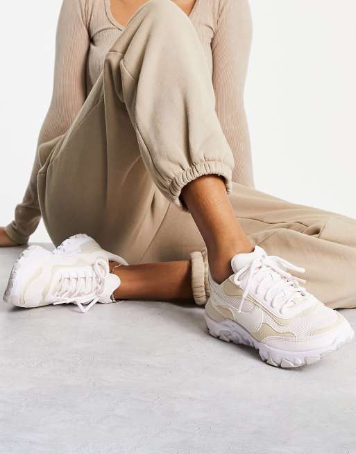 Nike – React Revision – Buty sportowe w kolorze różowym i kości słoniowej