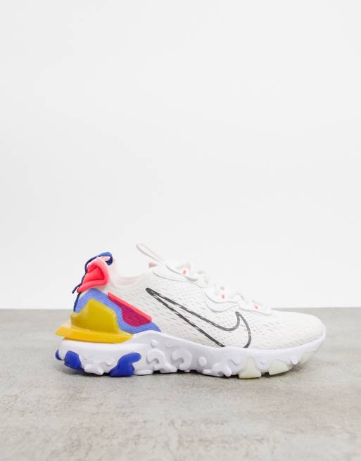 Nike React Vision trainers in white yellow and pink