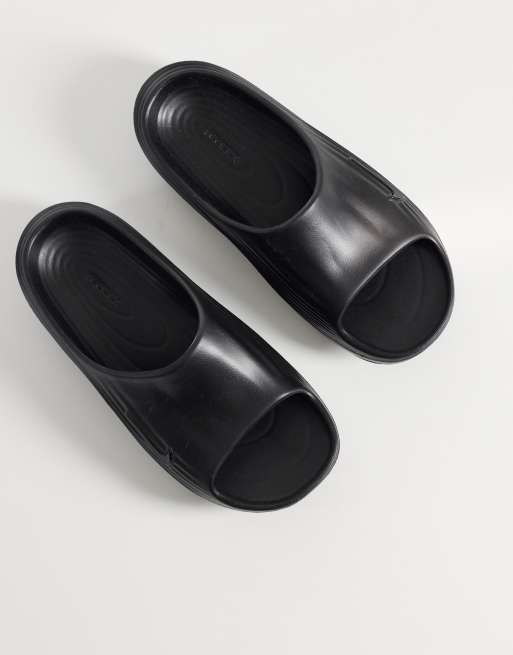 Nike ReactX Rejuven8 slides in black | ASOS