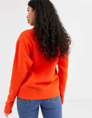 nike red mini swoosh oversized sweatshirt