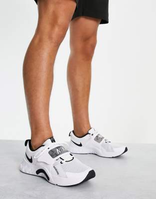 Nike Renew Retaliation 4 sneakers in white | ASOS