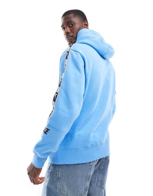 Nike Repeat logo hoodie in blue ASOS