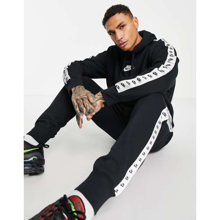 Nike black hot sale tape tracksuit