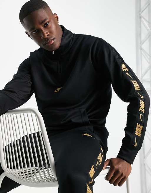 Nike cheap tracksuit gold