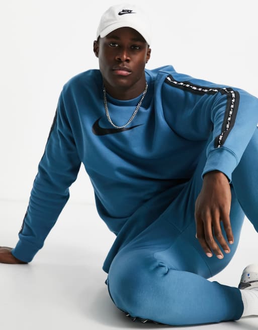 Nike blue sale taped tracksuit