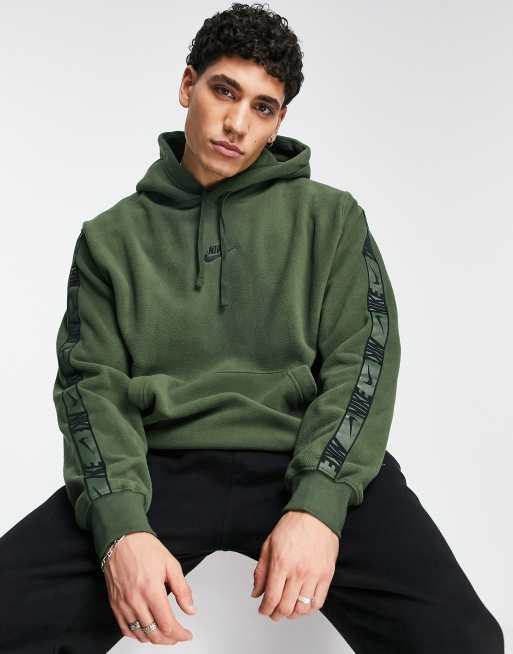 Nike Repeat logo taping polar fleece hoodie in green | ASOS
