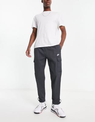 nike sportswear repeat men's woven trousers