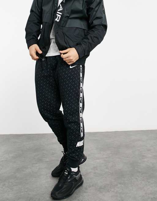 Nike repeat pack discount logo taping cuffed joggers