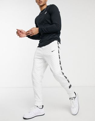 Nike Repeat Pack tracksuit in all over 