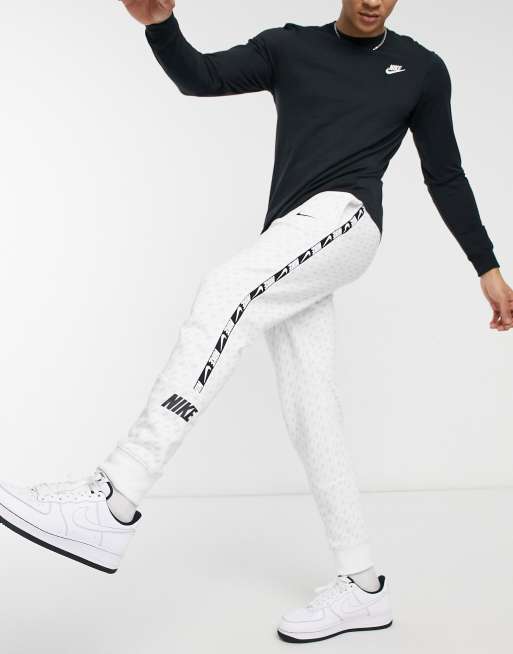 Nike repeat pack logo taping cuffed joggers sale