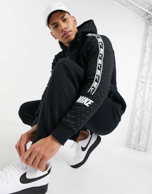 Nike Repeat Pack all over logo print taping hoodie in black