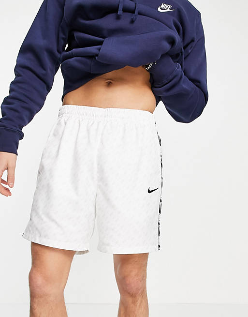 Men Nike Repeat Pack all over logo print woven taping shorts in white 
