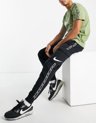 Nike logo taping cheap cuffed joggers in black