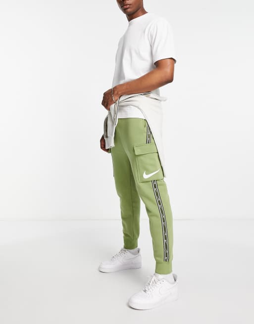 Nike repeat pack logo discount taping cuffed joggers in khaki