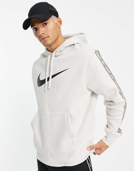 Nike repeat pack logo hoodie in beige