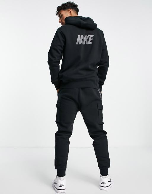 Nike taping skinny store fit joggers in black