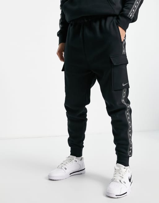 Nike Repeat Pack logo taped cargo joggers in black