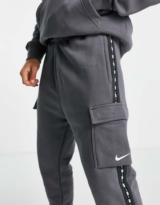 Nike Repeat Pack logo taped cargo joggers in iron grey