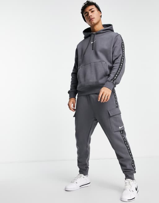 Nike repeat pack logo 2025 taping cuffed joggers in grey