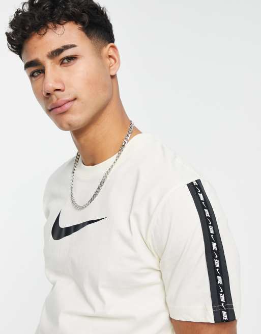 Nike Repeat Pack logo taped t-shirt in off white |