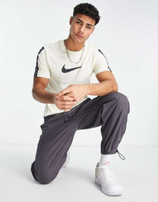 Nike Repeat Pack logo taped t shirt in off white ASOS