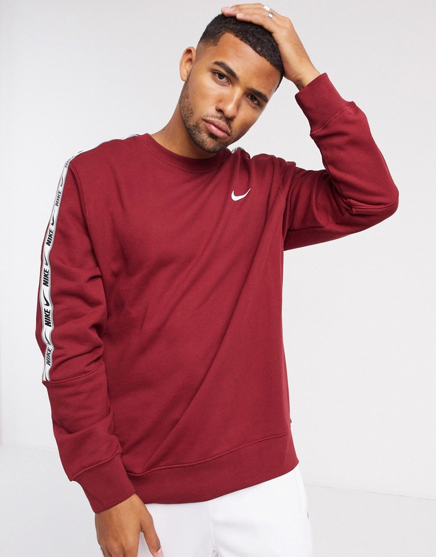 Nike Repeat Pack logo taping crew neck sweat in burgundy-Red