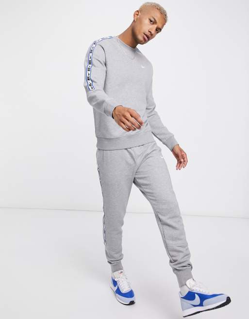 Nike repeat pack logo taping discount crew neck sweat in grey