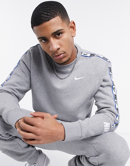 Nike Repeat Pack logo taping crew neck sweat in grey | Monroe Clothing