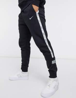 Nike repeat pack logo taping cuffed joggers sale