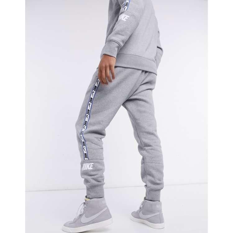 Nike tape poly discount joggers junior grey