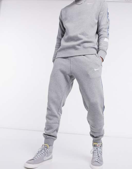 Nike double swoosh online grey tracksuit