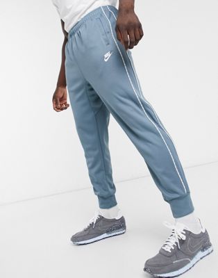 nike repeat poly tracksuit
